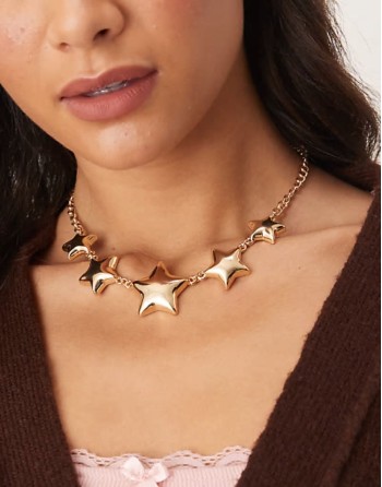statement gradient star necklace in gold statement gradient star necklace in gold