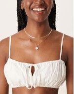 multirow necklace with semi precious stone in gold tone