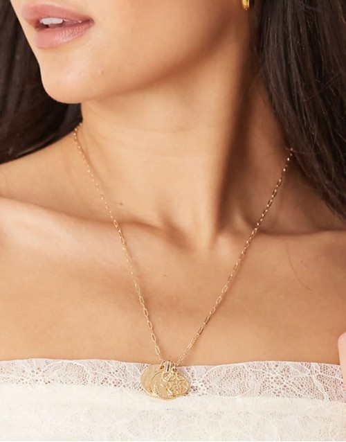 necklace with coin pendants in gold tone