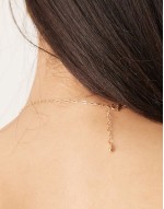 necklace with coin pendants in gold tone